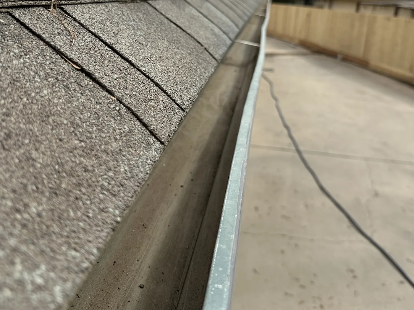 A cleaned roof gutter on a Porterville home